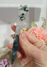 Load image into Gallery viewer, SECONDS STOCK polished Moss Agate Athame (Dagger) Crystal Carving Stone.
PROMOTES GROUNDING AND CONNECTION TO EARTH
An Athame is a ceremonial knife used in spiritual rituals to direct energy, cast circles, and represent the element of fire or air, but it is typically not used for physical cutting.
dagger / Athame Moss Agate crystal carving. discounted as has lots of imperfection.