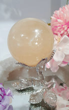Load image into Gallery viewer, Honey Calcite Sphere Crystal Carving Stone on Silver Stem stand
INSPIRES SELF WORTH AND CONFIDENCE
lovely Honey Calcite sphere on silver stem stand