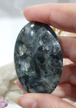 Load image into Gallery viewer, Lavakite Palm Stone Crystal Carving on Stand
Inspires Protection and Grounding
Beautiful Lavakite Palmstone palm stome Crystal Carving on stand. So much shine on thie stone.