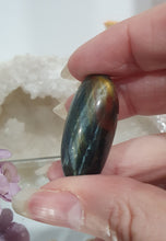 Load image into Gallery viewer, Blue Tigers Eye Crystal Tumble Stone
Inspires Courage
Gorgeous Blue Tigers Eye Crystal Tumble Stone. Absolutely stunning shine