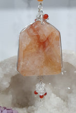 Load image into Gallery viewer, THE FIRE WITHIN" Handcrafted Fire Quartz Tower Crystal Carving Silver Crystal Energy Enhancer© Gemstone / Hanger / Suncatcher / Ornament
STRENGTH | POWER | SPIRITUALITY
Beautiful Fire Quartz Tower Carving Crystal Energy Enhancer© / Sun Catcher / Ornament / Hanger beaded with Fire Quartz, Carnelian and Quartz. wired in Silver