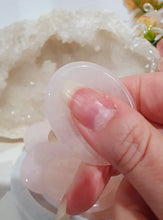 Load image into Gallery viewer, Worry Stone" Rose Quartz Crystal Carving Stone.
INSPIRES UNCONDITIONAL LOVE & HARMONY
What is a worry Stone? Perfectly shaped for your thumb, this crystal worry stone connects you to positive energy. Rubbing its smooth surface allows it to act as a powerful vessel for emotional release from anxiety and stress.
Lovely Rose Quartz crystal worry stone crystal carving. Pop in your bag and keep with you to alleviate stress. Intuitively ( Randomly) chosen.
