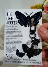 Load image into Gallery viewer, "THE LIGHTSEEKER" Metal Moth Keyring Key chain with Quartz Beads Stone Crystal Key Ring
INSPIRES GUIDANCE AND TRANSFORMATION
Carry a little Light wherever life takes you!
Gorgeous black coloured metal Moth Keyring Key ring with rose charm, beaded with Quartz.