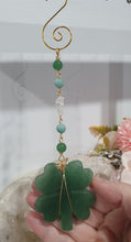 Load image into Gallery viewer, LUCKY FOUR-LEAF CLOVER BLESSINGS" Handcrafted Aventurine Crystal Carving Gold Stone Crystal Energy Enhancer© / Hanger / Ornament / Suncatcher
Promotes GOOD FORTUNE | HOPE | MAGIC | PROTECTION
A four-leaf clover Symbolises good luck and abundance. It is believed if you hold a four-leaf clover you will gain the ability to see fairies and leprechauns and find their treasures.
Beautiful Aventurine four-leaf clover crystal carving beaded with Amazonite, Aventurine and Quartz. Wire wrapped in Gold.