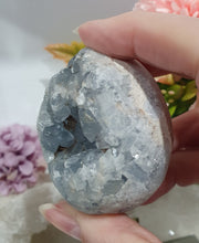 Load image into Gallery viewer, Celestite Egg Crystal Carving on silver Stand.
Inspires Communication with the Angels
Gorgeous Celestite egg Crystal Carving on silver Stand.