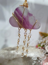 Load image into Gallery viewer, Lovely "EVERY CLOUD HAS A SILVER LINING" Fluorite Cloud gold wired Crystal Energy Enhancer© Hanger Ornament Suncatcher.
From Darkness comes Light.
TRANSFORMATION / INTUITION / SPIRITUALITY
Beautiful Fluorite Cloud Crystal Carving beaded with Fluorite & Quartz. wired in Gold