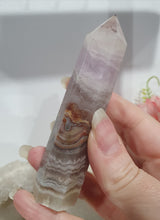 Load image into Gallery viewer, SECONDS STOCK - Amethyst Agate Crystal Point Tower Stone
THIS POINT IS A TAD WOBBLY
INSPIRES INTUITION AND WELLBEING
Amethyst Agate Tower Crystal Stone. is a little wobbly.