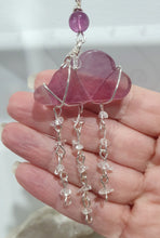 Load image into Gallery viewer, Lovely "EVERY CLOUD HAS A SILVER LINING" Fluorite Cloud silver wired Crystal Energy Enhancer© Hanger Ornament Suncatcher.
From Darkness comes Light.
TRANSFORMATION / INTUITION / SPIRITUALITY
Beautiful Fluorite Cloud Crystal Carving beaded with Fluorite & Quartz. wired in Silver