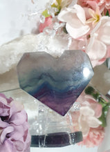 Load image into Gallery viewer, Heart Fluorite Crystal Carving Stone on plastic Stand
Inspires CONCENTRATION AND STABILITY
Lovely Fluorite Heart crystal carving on plastic stand. super pretty.