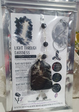 Load image into Gallery viewer, LIGHT THROUGH DARKNESS" Handcrafted Black Agate Tower Crystal Carving Silver Crystal Energy Enhancer© Gemstone / Hanger / Suncatcher / Ornament
STRENGTH | COURAGE | CLARITY
Beautiful Black Agate Tower Carving Crystal Energy Enhancer© / Sun Catcher / Ornament / Hanger beaded with Black Agate, Quartz and Herkimer Diamonds. wired in Silver