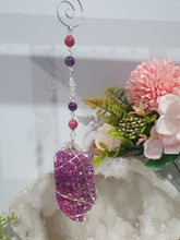 Load image into Gallery viewer, ENCHANTED AURA - Handcrafted Titanium Aura Quartz Crystal Energy Enhancer© / Hanger / Ornament / Suncatcher
inspires EMPOWERMENT | COMPASSION | MAGICK
Gorgeous Titanium Aura Quartz crystal beaded with Rhodochrosite, Amethyst and Rose Quartz. Wire wrapped in silver
Genuine Crystals. no plastic or glass. Ensuring energy flow throughout the enhancer. Crystal Suncatchers