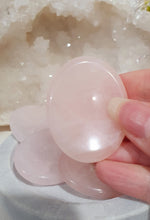 Load image into Gallery viewer, Worry Stone" Rose Quartz Crystal Carving Stone.
INSPIRES UNCONDITIONAL LOVE & HARMONY
What is a worry Stone? Perfectly shaped for your thumb, this crystal worry stone connects you to positive energy. Rubbing its smooth surface allows it to act as a powerful vessel for emotional release from anxiety and stress.
Lovely Rose Quartz crystal worry stone crystal carving. Pop in your bag and keep with you to alleviate stress. Intuitively ( Randomly) chosen.