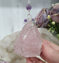 Load image into Gallery viewer, THE LOVE BOMB Rose Quartz Crystal Rough Silver Wired Crystal Energy Enhancer© Hanger Ornament Suncatcher. Inspires Unconditional Love, Harmony, Spirituality. Crystal Suncatchers