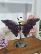 Load image into Gallery viewer, Amethyst Butterfly Wings Crystal Carving Stone on Stand.
Inspires Intuition and Spirituality
Beautiful Amethyst Stone Butterfly Wings Crystal Carving on stand. These have amazing inclusions in them.