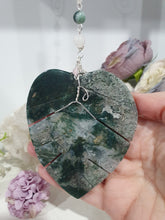 Load image into Gallery viewer, LEAF OF RENEWAL Moss Agate Leaf silver Crystal Energy Enhancer© Hanger Ornament Suncatcher, Inspires Spiritual Growth, Love & Balance. Beaded with Moss Agate and Rose Quartz. Crystal Suncatchers