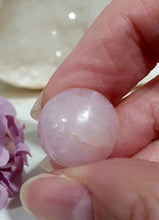 Load image into Gallery viewer, Mini Kunzite Sphere Crystal Carving on Silver Stand Inspiring Peace and Joy