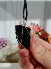 Load image into Gallery viewer, Gorgeous Black Tourmaline crystal stone wire wrapped in silver with black cord. Black Tourmaline promotes protective energy.