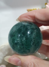 Load image into Gallery viewer, Fluorite Sphere Crystal Carving Stone on Silver Stand
Inspires CONCENTRATION AND STABILITY
Lovely Fluorite Crystal Sphere on silver stand. super pretty. Feather fluorite. Amazing pattern.