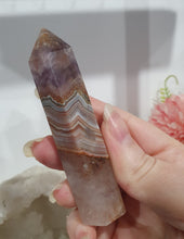 Load image into Gallery viewer, SECONDS STOCK - Amethyst Agate Crystal Point Tower Stone
THIS POINT IS A TAD WOBBLY
INSPIRES INTUITION AND WELLBEING
Amethyst Agate Tower Crystal Stone. is a little wobbly.