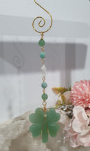 Load image into Gallery viewer, "LUCKY FOUR-LEAF CLOVER BLESSINGS" Handcrafted Aventurine Crystal Carving Gold Stone Crystal Energy Enhancer© / Hanger / Ornament / Suncatcher
Beautiful Aventurine four-leaf clover crystal carving beaded with Amazonite, Aventurine and Quartz. Wire wrapped in Gold.