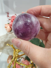 Load image into Gallery viewer, Purple Fluorite Sphere Crystal Carving Stone on Gold Branch shaped stand.