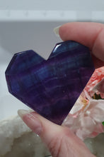 Load image into Gallery viewer, Heart Fluorite Crystal Carving Stone on plastic Stand
Inspires CONCENTRATION AND STABILITY
Lovely Fluorite Heart with blue colouring on plastic stand. super pretty.