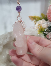 Load image into Gallery viewer, HEART OF A UNICORN" Aura Howlite Heart Stone Rose Gold Crystal Energy Enhancer© Hanger Ornament Suncatcher
Gorgeous Rose Quartz Unicorn Crystal Carving beaded with Amethyst, Rose Quartz, Rhodochrosite and Quartz. Wire wrapped in Rose Gold