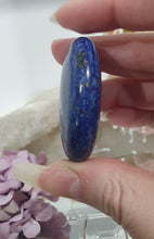 Load image into Gallery viewer, Lapis Lazuli Crystal Palm Stone palm stone on plastic stand.
INSPIRES HARMONY, WISDOM & PSYCHIC PROTECTION
Lovely Lapis Lazuli Crystal Palm stone with pyrite inclusions on plastic stand. So pretty.