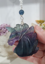 Load image into Gallery viewer, THE MYSTICAL UNICORN" Handcrafted Fluorite Unicorn Crystal Carving Silver Crystal Energy Enhancer© Gemstone / Hanger / Suncatcher / Ornament
PURITY | STRENGTH | MAGIC
Beautiful Fluorite Unicorn Carving Crystal Energy Enhancer© / Sun Catcher / Ornament / Hanger beaded with Fluorite and Quartz. wired in Silver
