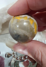Load image into Gallery viewer, Bumblebee Jasper Sphere Crystal Carving Stone on Silver Turtle Stand
Inspires New Opportunities and Possibilities
Stunning Bumblebee Jasper Crystal Sphere Carving Stone on silver turtle stand.
A gorgeous little sphere