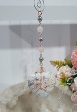 Load image into Gallery viewer, HEART OF A UNICORN" Aura Howlite Heart Stone Rose Gold Crystal Energy Enhancer© Hanger Ornament Suncatcher
INSPIRES MAGICK AND LOVE
Gorgeous Aura Howlite Heart beaded with Rose Quartz, Rainbow Hematite and Quartz. Wired in Rose Gold