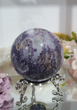 Load image into Gallery viewer, Purple Sphalerite Sphere Crystal Carving on Silver Stand.
Inspires Spirituality & Strength
Stunning Purple Sphalerite Crystal Sphere on Silver Sand. This has a gorgeous quartz vein and pocket of druzy.