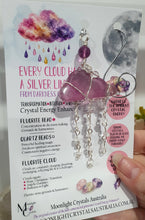 Load image into Gallery viewer, Lovely "EVERY CLOUD HAS A SILVER LINING" Fluorite Cloud silver wired Crystal Energy Enhancer© Hanger Ornament Suncatcher.
From Darkness comes Light.
TRANSFORMATION / INTUITION / SPIRITUALITY
Beautiful Fluorite Cloud Crystal Carving beaded with Fluorite & Quartz. wired in Silver