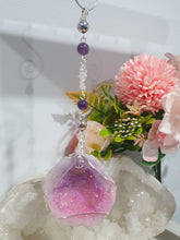 Load image into Gallery viewer, MAGICAL CRYSTAL CAVE - Handcrafted Titanium Aura Quartz Geode Crystal Energy Enhancer© / Hanger / Ornament / Suncatchers
DIVINE COMMUNICATION | HARMONY | MAGICK
Gorgeous Titanium Aura Quartz Geode crystal beaded with Rose Quartz, Amethyst and Rainbow Hematite. Wire wrapped in silver
Genuine Crystals. no plastic or glass. Ensuring energy flow throughout the enhancer.