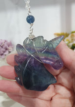 Load image into Gallery viewer, THE MYSTICAL UNICORN" Handcrafted Fluorite Unicorn Crystal Carving Silver Crystal Energy Enhancer© Gemstone / Hanger / Suncatcher / Ornament
PURITY | STRENGTH | MAGIC
Beautiful Fluorite Unicorn Carving Crystal Energy Enhancer© / Sun Catcher / Ornament / Hanger beaded with Fluorite and Quartz. wired in Silver