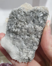 Load image into Gallery viewer, Apophyllite Crystal Cluster Specimen Stone on plastic Stand
Promotes Divine Guidance
Lovely Apophyllite crystal cluster on plastic stand. Has tiny crystals poking out of it. The photos just don't pick up the lovely sparkles.