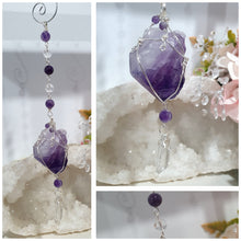 Load image into Gallery viewer, THE MYSTIC AWAKENING" Handcrafted Amethyst Raw Crystal Stone Silver Crystal Energy Enhancer© Hanger Ornament Suncatcher
INSPIRES INTUITION, WISDOM AND SPIRITUALITY
Stunning Raw Amethyst crystal stone beaded with Amethyst and Quartz. Wire wrapped in silver.
Crystal amethyst suncatchers ornaments hangers energy enhancers