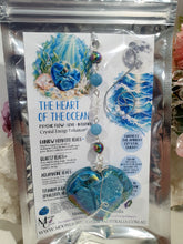 Load image into Gallery viewer, HEART OF THE OCEAN" Handcrafted Titanium Aura Sphalerite Heart Crystal Carving Silver Crystal Energy Enhancer© / Hanger / Ornament / Suncatcher
Inspires PSYCHIC FLOW | LOVE | INTUITION
Gorgeous Titanium Aura Sphalerite heart crystal carving stone beaded with Aquamarine, Rainbow Hematite & Quartz. Wire wrapped in silver
Crystal Christmas Tree Ornament