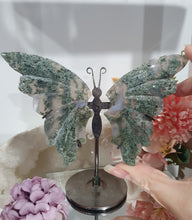 Load image into Gallery viewer, Moss Agate Butterfly Wings Crystal Carving Stone on Stand.
INSPRIES GROUNDING AND CONNECTION TO EARTH
Beautiful Moss Agate Stone Butterfly Wings Crystal Carving Stone on stand. Such lovely patterns.