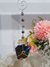 Load image into Gallery viewer, COSMIC ARMOUR - Handcrafted Rainbow Obsidian Stone Crystal Energy Enhancer© / Hanger / Ornament / Suncatcher
INSPIRES PROTECTION AND GROUNDING
Gorgeous Rainbow Obsidian raw crystal stone beaded with Rainbow Hematite and Hematite. Wire wrapped in silver