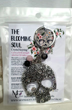 Load image into Gallery viewer, THE BLOOMING SOUL " Metal Skull Keyring Key chain with Rose Quartz & Black Obsidian Beads Stone Silver Crystal Key Ring
INSPIRES STRENGTH AND TRANSFORMATION
Carry a little Strength wherever life takes you!