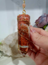 Load image into Gallery viewer, Beautiful Sunstone crystal tower beaded with apatite, sunstone and quartz suncatcher. inspires courage, joy and knowledge. Beautiful gift for any crystal lover. Hang in your room or space.