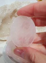 Load image into Gallery viewer, Worry Stone" Rose Quartz Crystal Carving Stone.
INSPIRES UNCONDITIONAL LOVE & HARMONY
What is a worry Stone? Perfectly shaped for your thumb, this crystal worry stone connects you to positive energy. Rubbing its smooth surface allows it to act as a powerful vessel for emotional release from anxiety and stress.
Lovely Rose Quartz crystal worry stone crystal carving. Pop in your bag and keep with you to alleviate stress. Intuitively ( Randomly) chosen.