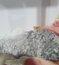 Load image into Gallery viewer, Apophyllite Crystal Cluster Specimen Stone on plastic Stand
Promotes Divine Guidance
Lovely Apophyllite crystal cluster on plastic stand. Has tiny crystals poking out of it. The photos just don't pick up the lovely sparkles.