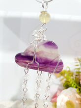 Load image into Gallery viewer, Lovely "EVERY CLOUD HAS A SILVER LINING" Fluorite Cloud silver wired Crystal Energy Enhancer© Hanger Ornament Suncatcher.
From Darkness comes Light.
TRANSFORMATION / INTUITION / SPIRITUALITY
Beautiful Fluorite Cloud Crystal Carving beaded with Fluorite & Quartz. wired in Silver