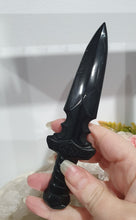 Load image into Gallery viewer, Beautiful polished Black Obsidian Athame (Dagger) Crystal Carving Stone.
An Athame is a ceremonial knife used in spiritual rituals to direct energy, cast circles, and represent the element of fire or air, but it is typically not used for physical cutting.