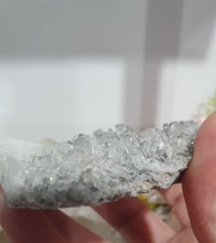Load image into Gallery viewer, Apophyllite Crystal Cluster Specimen Stone on plastic Stand
Promotes Divine Guidance
Lovely Apophyllite crystal cluster on plastic stand. Has tiny crystals poking out of it. The photos just don't pick up the lovely sparkles.