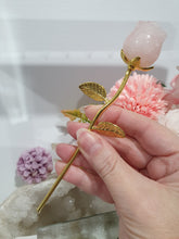 Load image into Gallery viewer, Rose Flower Rose Quartz Crystal Carving with gold stem.
Promotes Unconditional Love and Harmony
Beautiful Rose Quartz Flower / Rose Crystal Carving with gold stem and leaves.