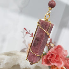 Load image into Gallery viewer, COMPASSION / SELF WORTH / SPIRITUAL GROWTH Rhodonite Crystal Point gold Energy Enhancer / Sun Catcher / Hanger 170mm 2
