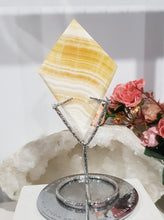 Load image into Gallery viewer, Diamond Orange Calcite Crystal Carving on Silver Stand Stone 165mm 4 BEAUTIFUL BANDING
